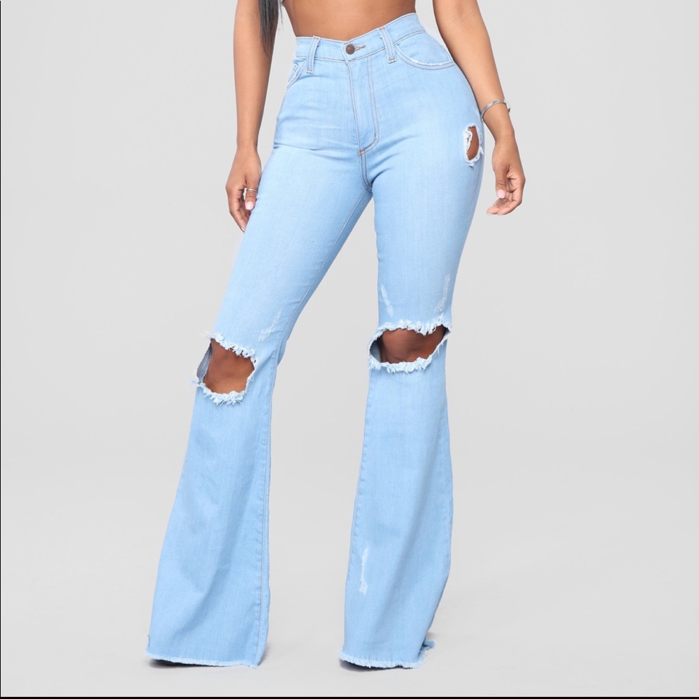 Destroyed flared/wide leg jeans